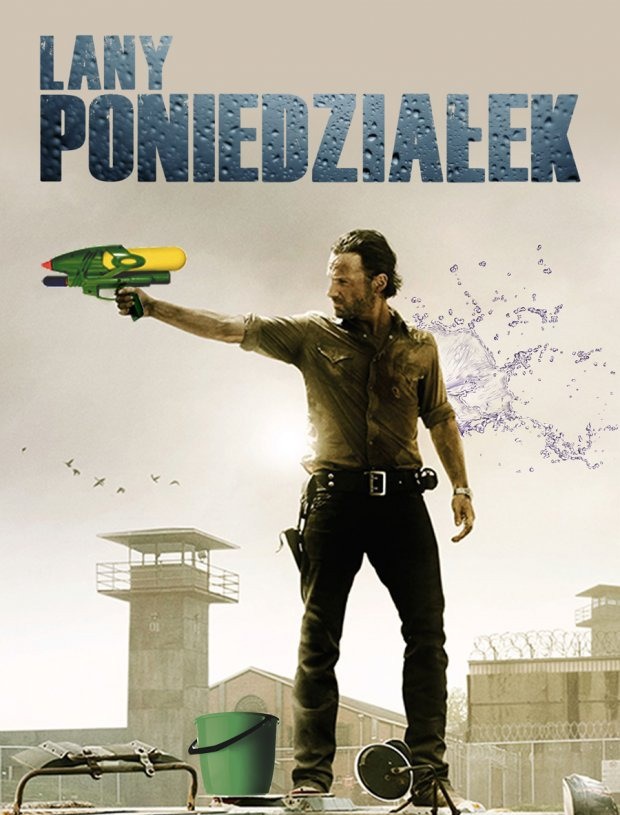 Mężczyzna stojący z pistoletem na wodę